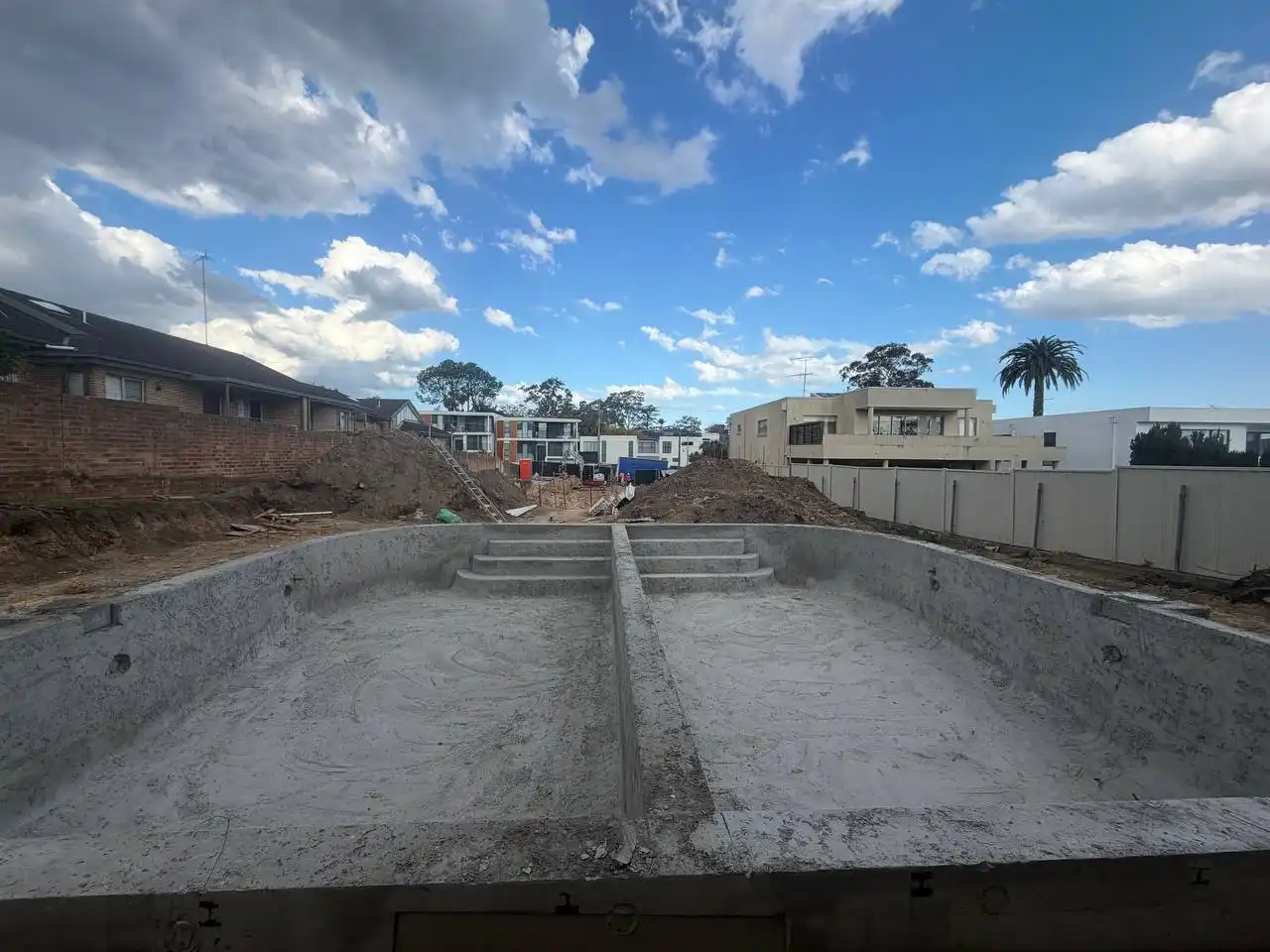Concrete cover for pool reinforcement